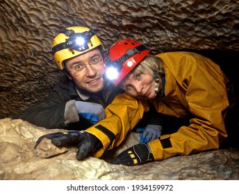 Adventurous middle age couple exploring cave on Vancouver Island. British Columbia. Canada  - Powered by Shutterstock