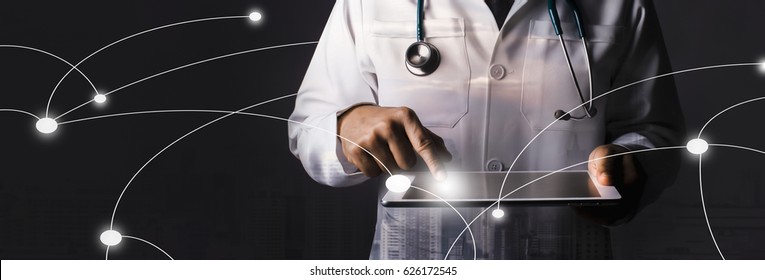 Advertise  Doctor medical digital network concept    Cropped image Doctor and stethoscope  holding digital tablet   background blur building skyscrapers in black   grey tone  Panorama