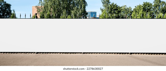 Advertisement blank long horizontal billboard with copy space for commercial info fixed on urban fence front view