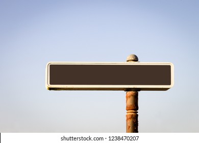 Advertisement Direction Landmark Sign Mockup. Brown, Rustic Post. Clear Blue Sky. Copy Space.