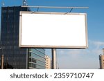 Advertising biilboard mock-up in front of the modern office building