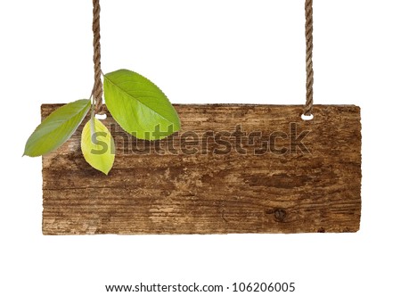 Advertising board on thread with green leaves on white