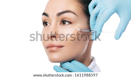 Advertising botulinum toxin injections in the face. Arrows show skin rejuvenation effect, macro