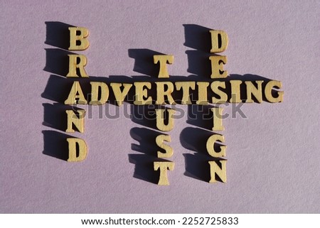 Advertising, Brand, Trust, Design, words in wooden alphabet letters in crossfire isolated on background