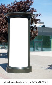 Advertising column mockup. Blank public information board mock up in front of the modern architecture building