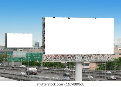 Advertising Concept, Blank Template For Outdoor Advertising Or Blank Billboard On The Highway In City. With Clipping Path On Screen - Can Be Used For Trade Shows, Promotional Poster.