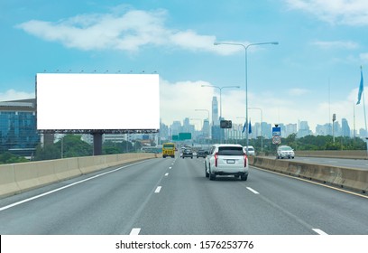 Advertising Concept, Blank Template  For Outdoor Advertising Or Blank Billboard On The Highway In City. With Clipping Path On Screen - Can Be Used For Trade Shows, Promotional Poster.