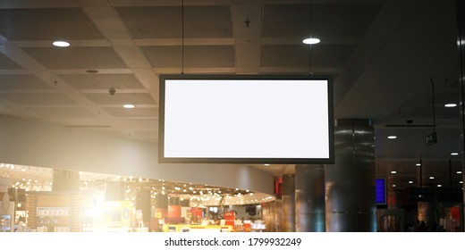 advertising empty monitor with mock-up hanging in center mall building indoor
