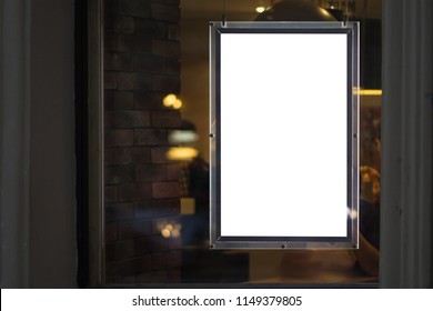 Advertising Glowing Panel In The Window Of The Shop Mockup.