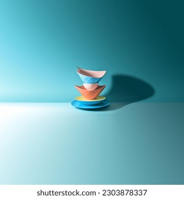Advertising - product photo of ceramic kitchen dishes colored stapled  blue background - Shutterstock ID 2303878337