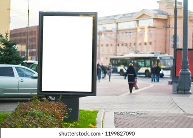 Advertising Space Under The Poster. Lightposter Citylight Mockup Small Billboard In The City Near The Roadway. White Space For Advertising