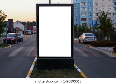 Advertising Space Under The Poster. Lightposter Citylight Mockup Small Billboard In The City Near The Roadway. White Space For Advertising