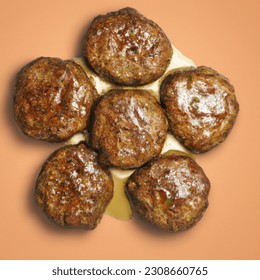 Advertising - testimonial photo of 6 salisbury steak patties top view, lightly sauced, mound