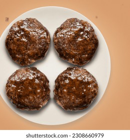 Advertising - testimonial photo of 6 salisbury steak patties top view, lightly sauced, mound