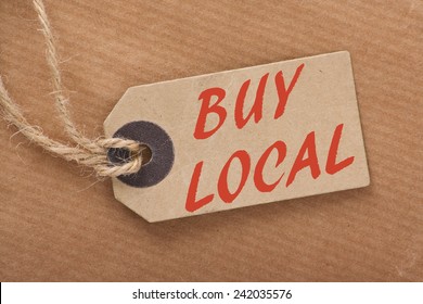 Advice To Buy Local Printed On A Brown Paper Price Tag As A Means Of Supporting Local Suppliers And Producers