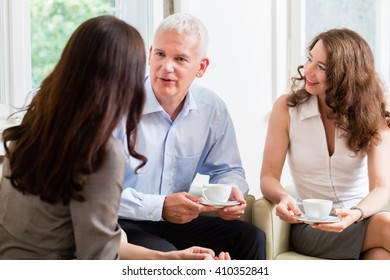 Adviser Giving Investment And Retirement Advice To Senior Woman And Man