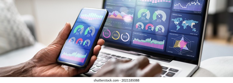 Advisor Using KPI Analytics Dashboard Charts On Laptop Computer