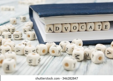 Advocate Word Written On Wood Block