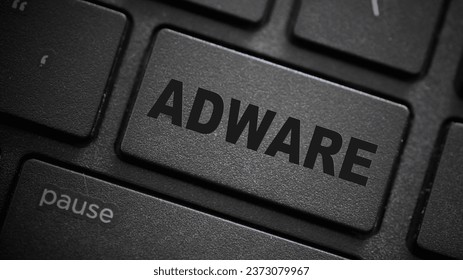 Adware text button on computer keyboard