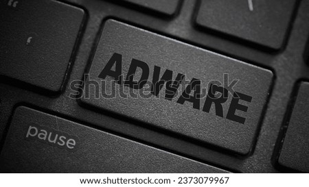 Adware text button on computer keyboard