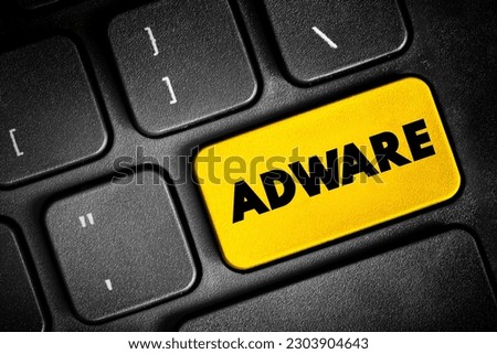 Adware - unwanted software designed to throw advertisements up on your screen, text concept button on keyboard