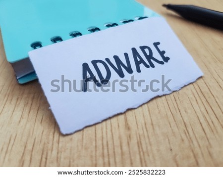 Adware writting on table background.
