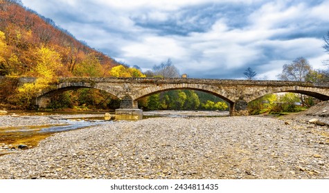 Adyghe attraction next to the village of Dakhovskaya is a stone bridge over the Dah River. The bridge was built in 1906 by Cossacks. The secret of the strength of the bridge in building materials: in  - Powered by Shutterstock