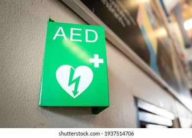 AED Station Sign In Metallic Green Color Plate, Equipment Using As Medical Treatment For Heart Attack Incident. Sign And Symbol Object For Healthcare.