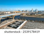 Aerail of downtown Milwaukee skyline with Hoan Bridge, Kinnickinnic River and water reclamation.