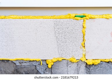 Aerated Concrete Blocks Installed On Mounting Foam. Construction Of Houses And Buildings From Modern, Lightweight Materials. Big Plan