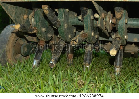 Aerator tines for core lawn aeration