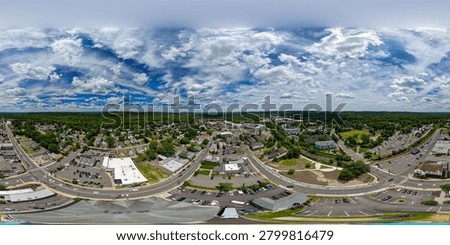 Aerial 360 panoramic view capturing the suburban landscape of berkeley heights, union county, new jersey, featuring housing, commercial areas, and roads on a bright day