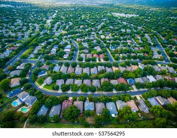 Aerial Amazing Gorgeous View Over Central Texas Suburb Housing Community With Rows Of Homes And Thousands Of New Houses Suburbia Austin Texas USA