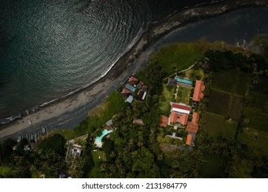 Aerial Balck Sand View And Green Trees Along Saba Beach, Gianyar, Bali.