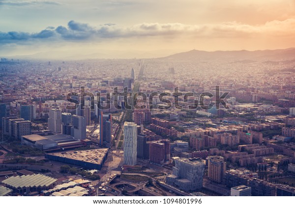 Aerial Barcelona skyline view with\
skyscrapers, Spain. Vintage colors with light\
leak