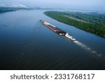 Aerial of barge on Mississippi River in Baton Rouge, Louisiana.