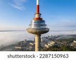 Aerial beautiful spring morning fog view of Vilnius TV Tower Lithuania