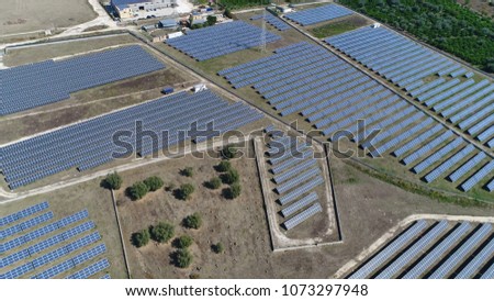 Aerial bird view photo photovoltaic power station also known as solar park solar farm or solar ranch is large scale photovoltaic system PV designed for supply of merchant power into electricity grid
