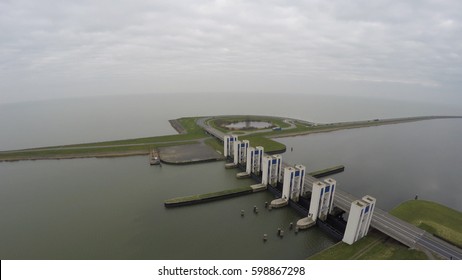 Aerial Bird View Of Sluice Flying East Side Showing Sluice And IJsselmeer Right And Markermeer Left Lelystad Flevopolder Near Amsterdam Part Of Zuiderzee Works Zuiderzeewerken Water Management