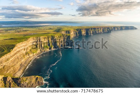 Aerial birds eye drone view from the world famous cliffs of moher in county clare ireland. Scenic Irish rural countryside nature along the wild atlantic way and European Atlantic Geotourism Route 