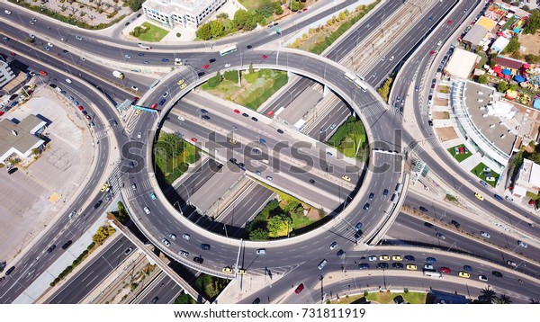 Aerial bird's eye photo of highway and ring road
passing through city
center