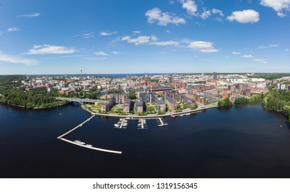 Aerial birds eye view of the Tampere city at sunny summer day in Finland. In the foreground is the new Ratina residential area and on the left the Etelapuisto