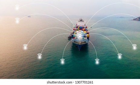 Aerial Of Cargo Maritime Ship Carrying Container And Running For Export  Goods  From  Cargo Yard Port To Other Ocean Concept Freight Shipping Ship And Line Connection Wireless .