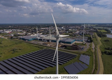 Aerial Circular Economy Concept Wind Turbines, Water Treatment And Bio Energy Facility And Solar Panels In The Netherlands