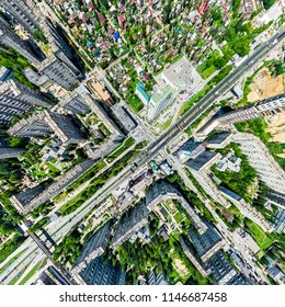 Aerial city view with crossroads and roads, houses, buildings, parks and parking lots, bridges. Helicopter drone shot. Wide Panoramic image. - Shutterstock ID 1146687458