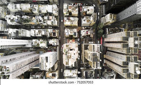 Aerial city view with crossroads and roads, houses, buildings and parking lots. Helicopter drone shot. Wide Panoramic image. - Shutterstock ID 752057053