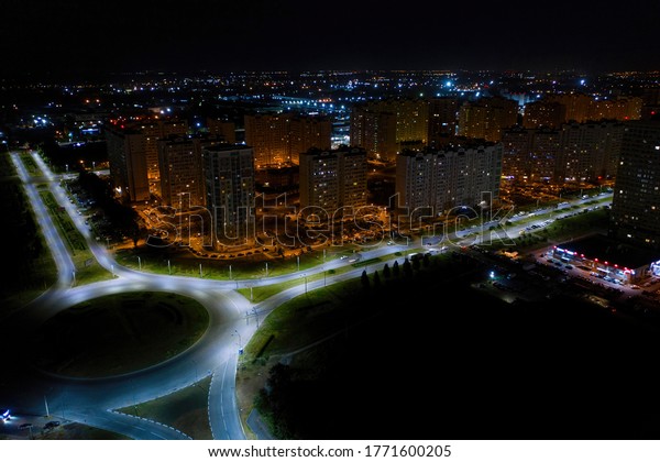 Aerial\
city view with road at night. Urban landscape.\
