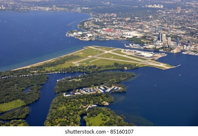 Aerial Cityscape Above The City Centre Airport In Toronto Ontario, Toronto Lake Shore During The Formula One Races In The Background