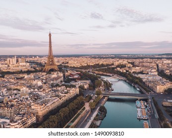 Aerial of the Cityscape of Paris shortly after sunrise with the iconic Eiffel Tower in the centre - Shutterstock ID 1490093810