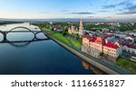 Aerial cityscape of Rybinsk: Volga river embankment, cathedral and bridge